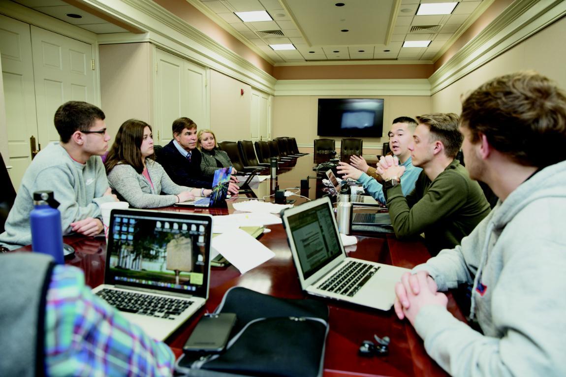 Dr. Tim Pierson discusses campus issues with student leaders at a Student Government Association (SGA) executive meeting.
