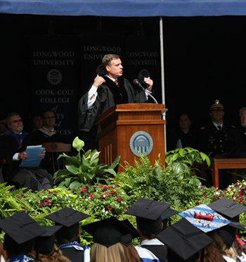 U.S. Sen. Mark Warner speaking at Longwood's commencement ceremony.