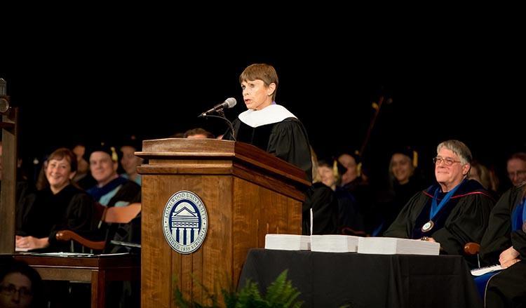 Joan Brock delivers an address at the 2018 Longwood Graduate Commencement Ceremony.